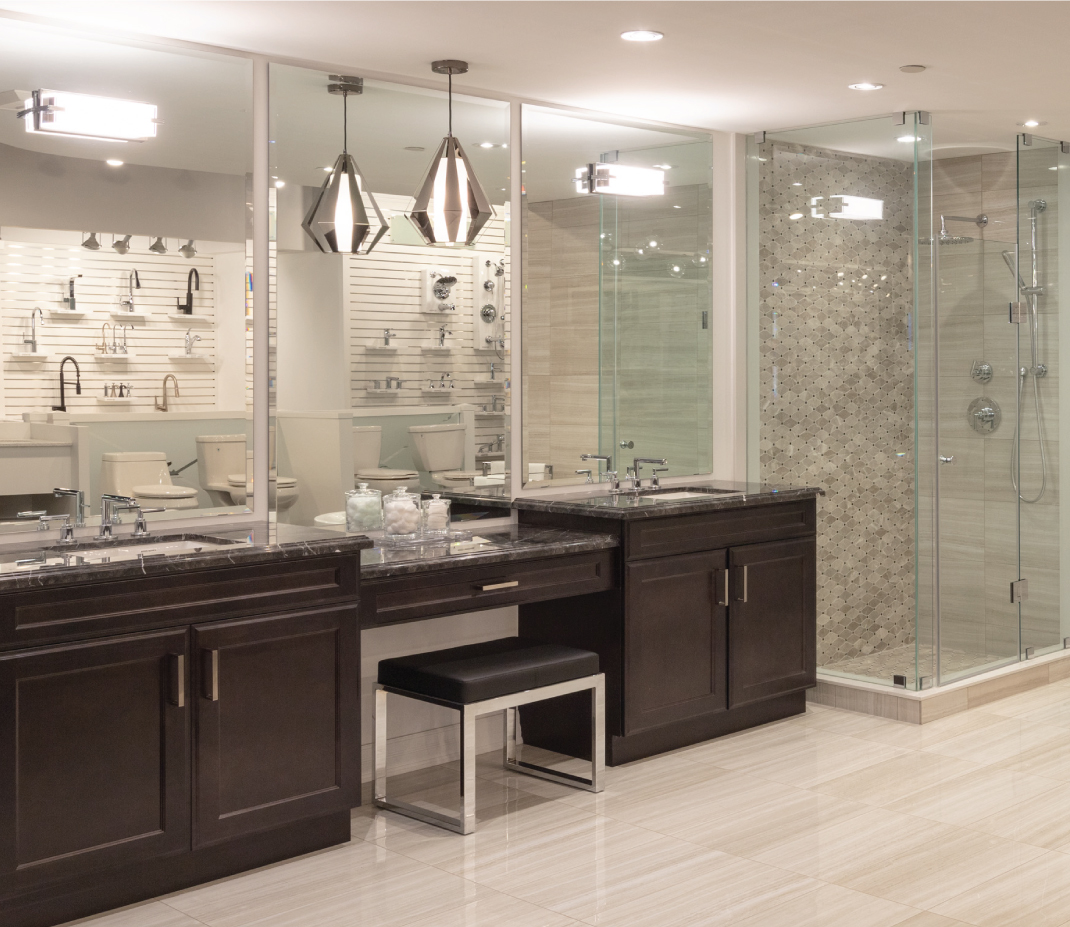 Image of Décor Studio's bathroom & ensuite finishes area, featuring a wide selection of taps, shower heads, and more